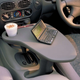 Imagen para el artículo titulado Ford ofrecía esta mesa de trabajo para el conductor en 1990, y es simplemente increíble